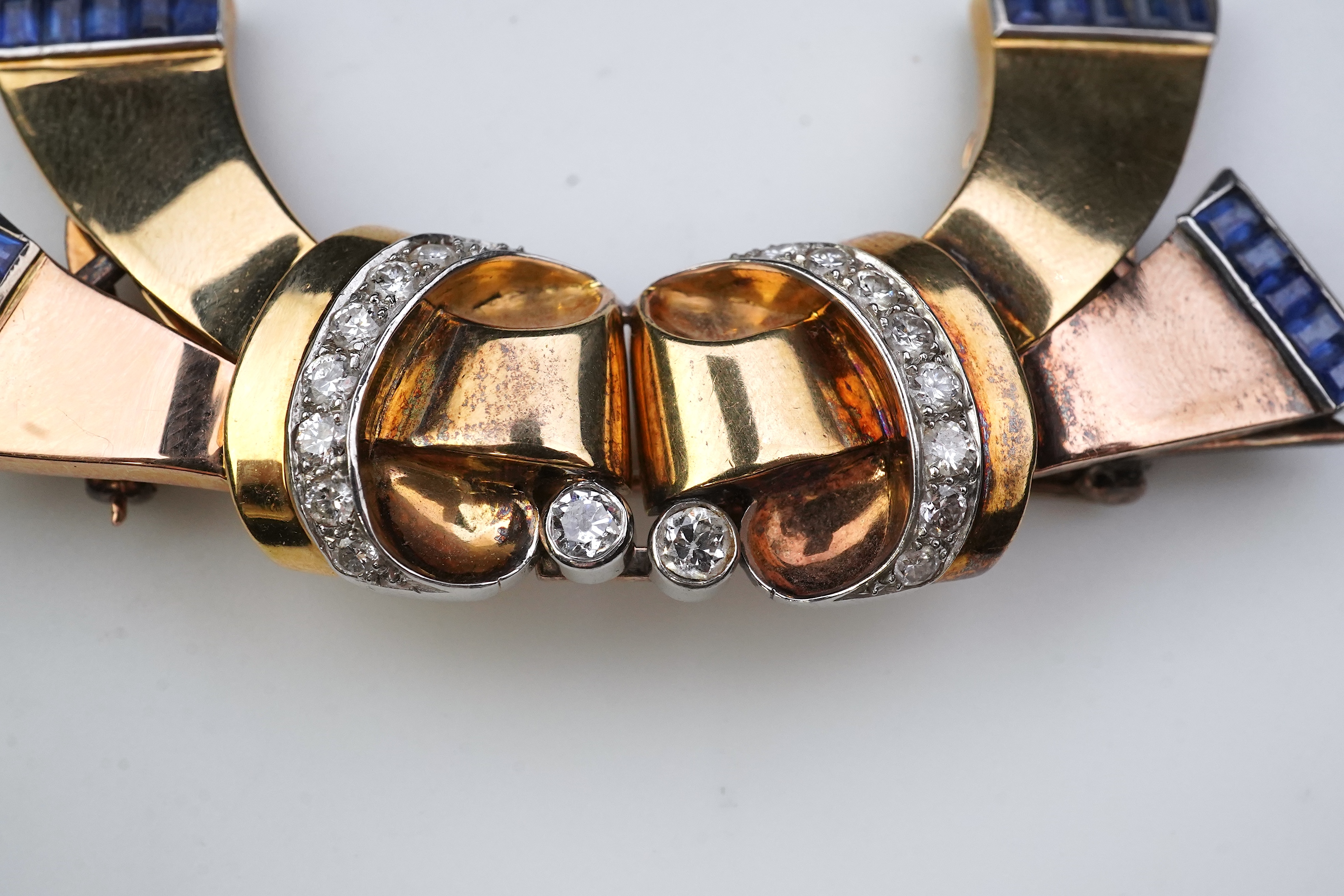 A Retro gold, sapphire and diamond double clip brooch, circa 1940
